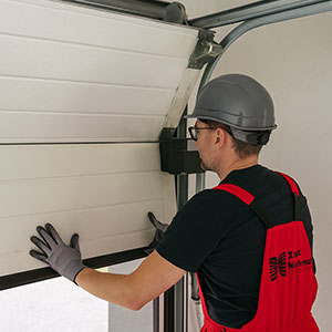 Porte de garage ne s’ouvre plus - reparation porte de garage par technicien - Xpert Portail