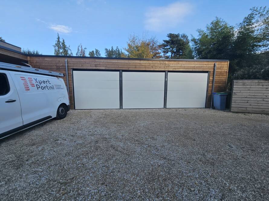 une porte de garage sectionnelle xpert portail