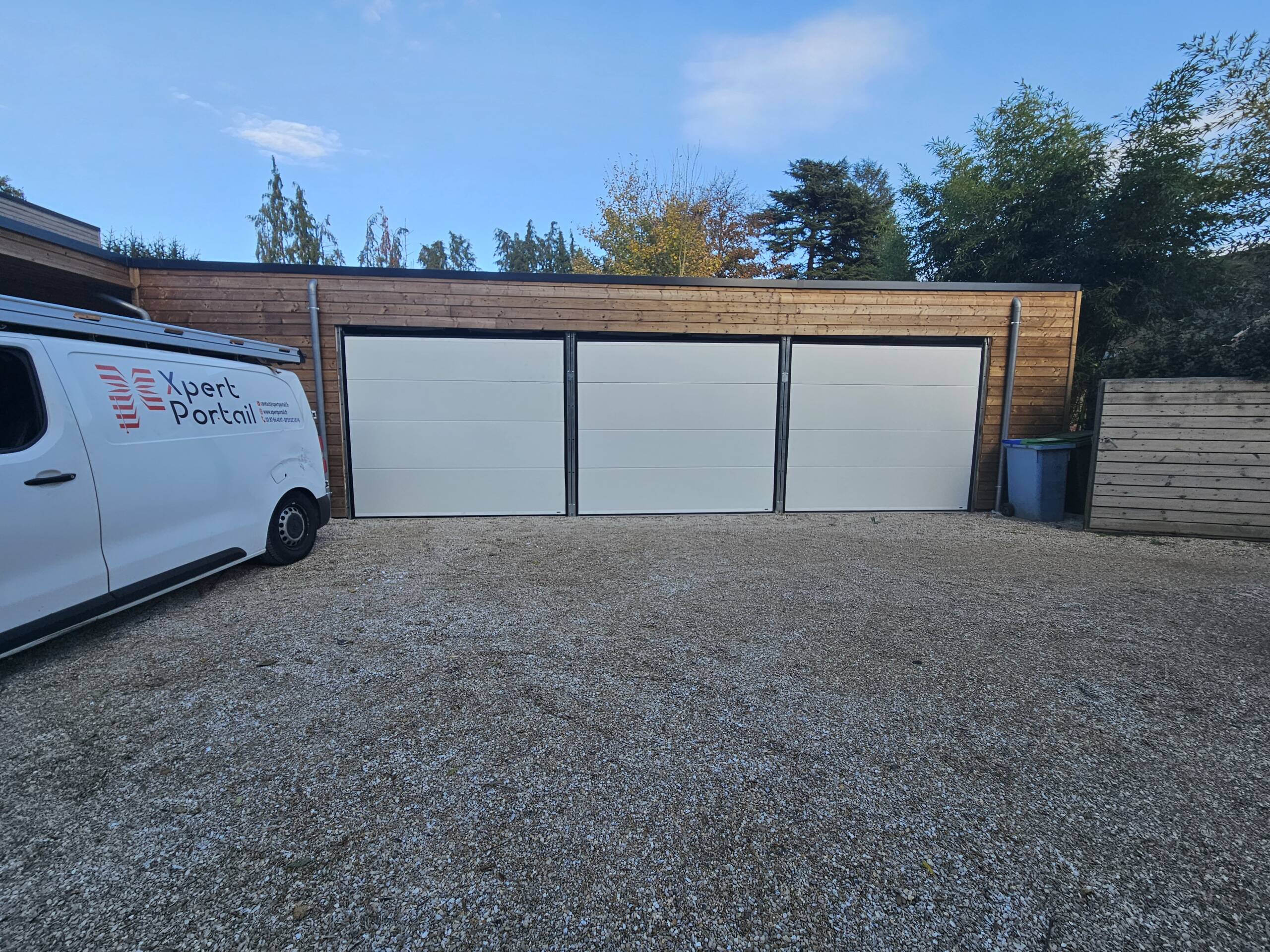 une porte de garage sectionnelle xpert portail